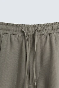 RELAXED FIT FLOWY PANTS