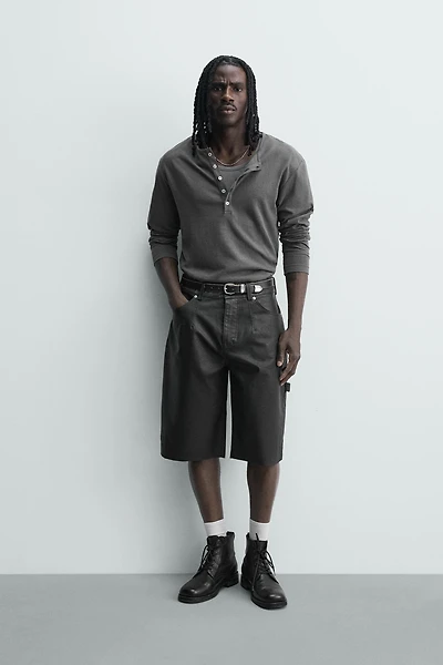 RELAXED FIT FAUX LEATHER SHORTS