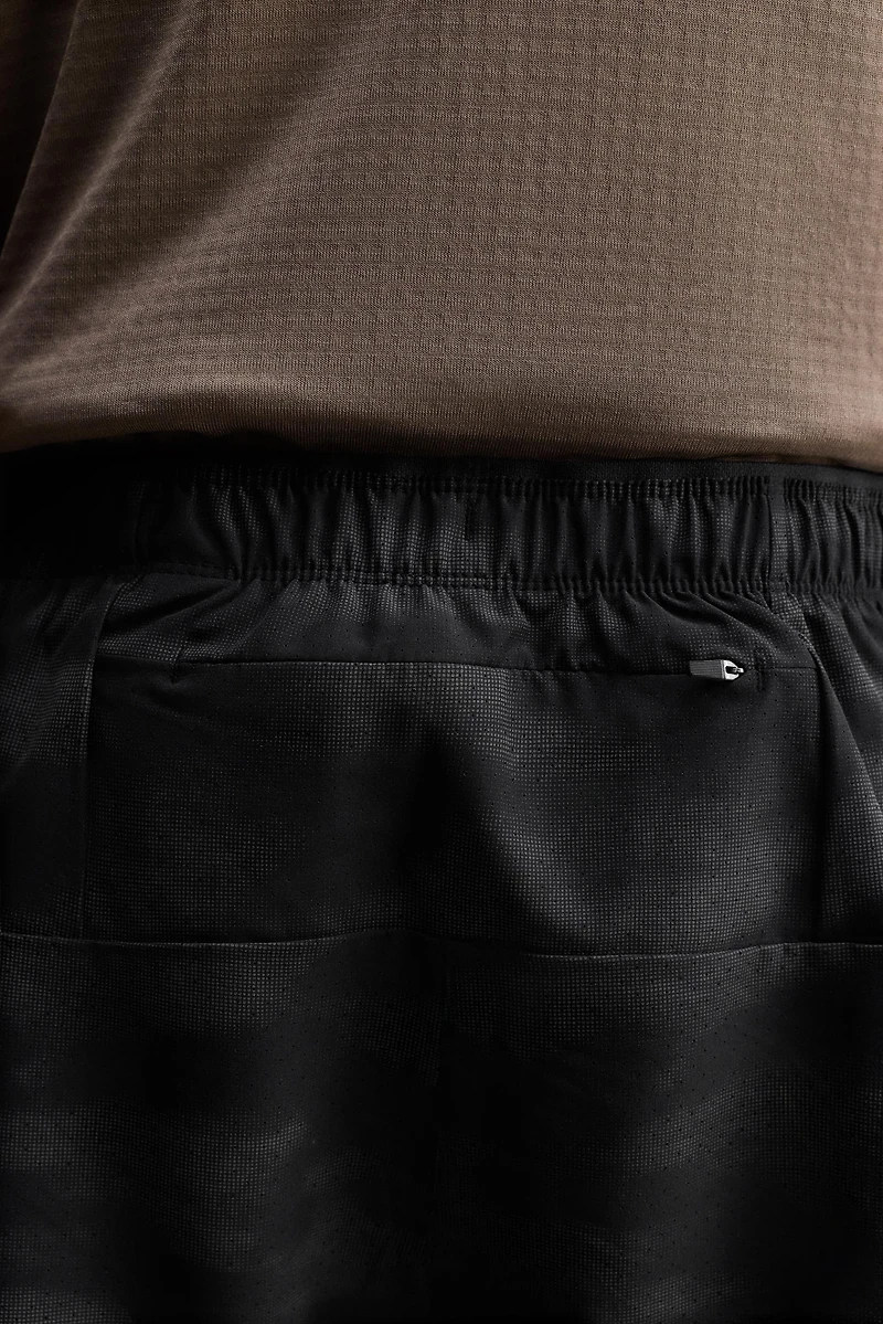 PERFORATED RUNNING SHORTS