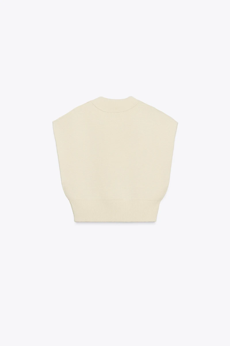 GILET COURT EN MAILLE UNIE