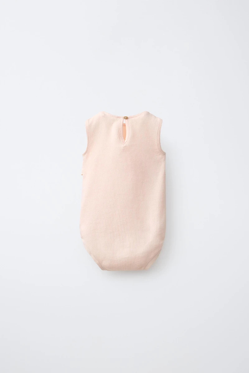 SUN EMBROIDERED RUFFLED BODYSUIT