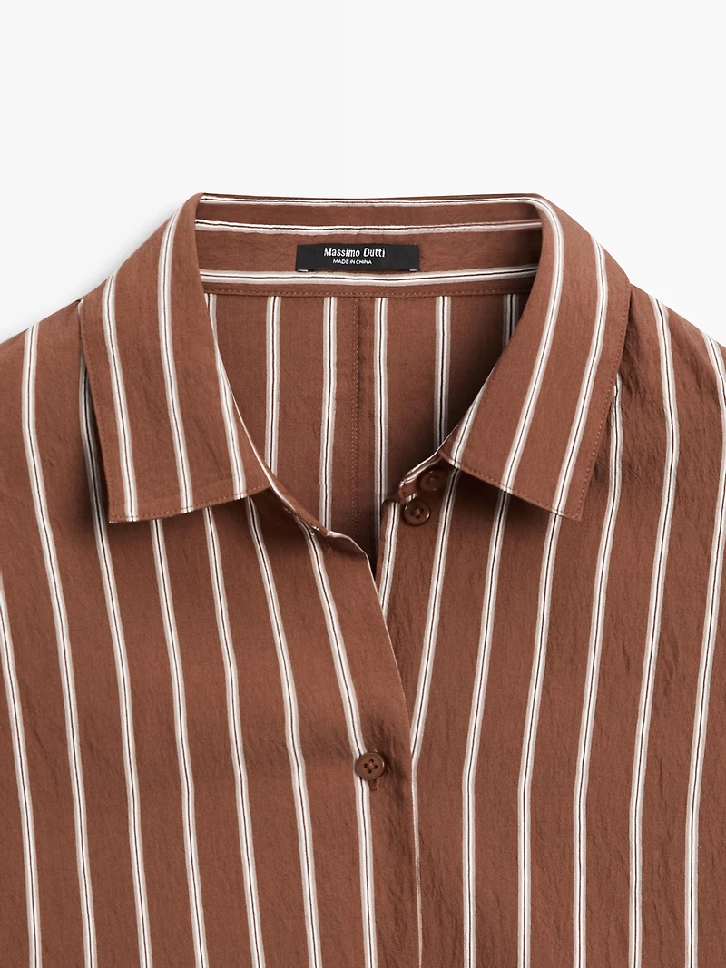 Flowing striped shirt with batwing sleeves