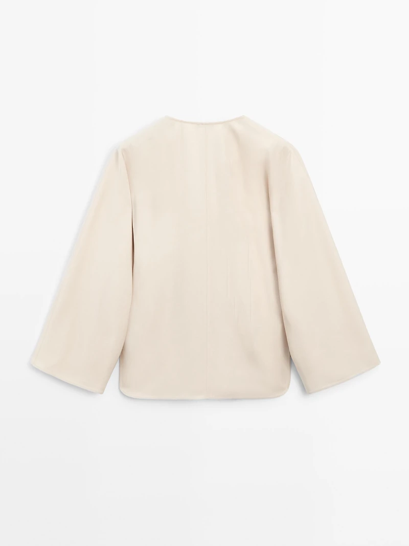 Flowing blouse with slit details