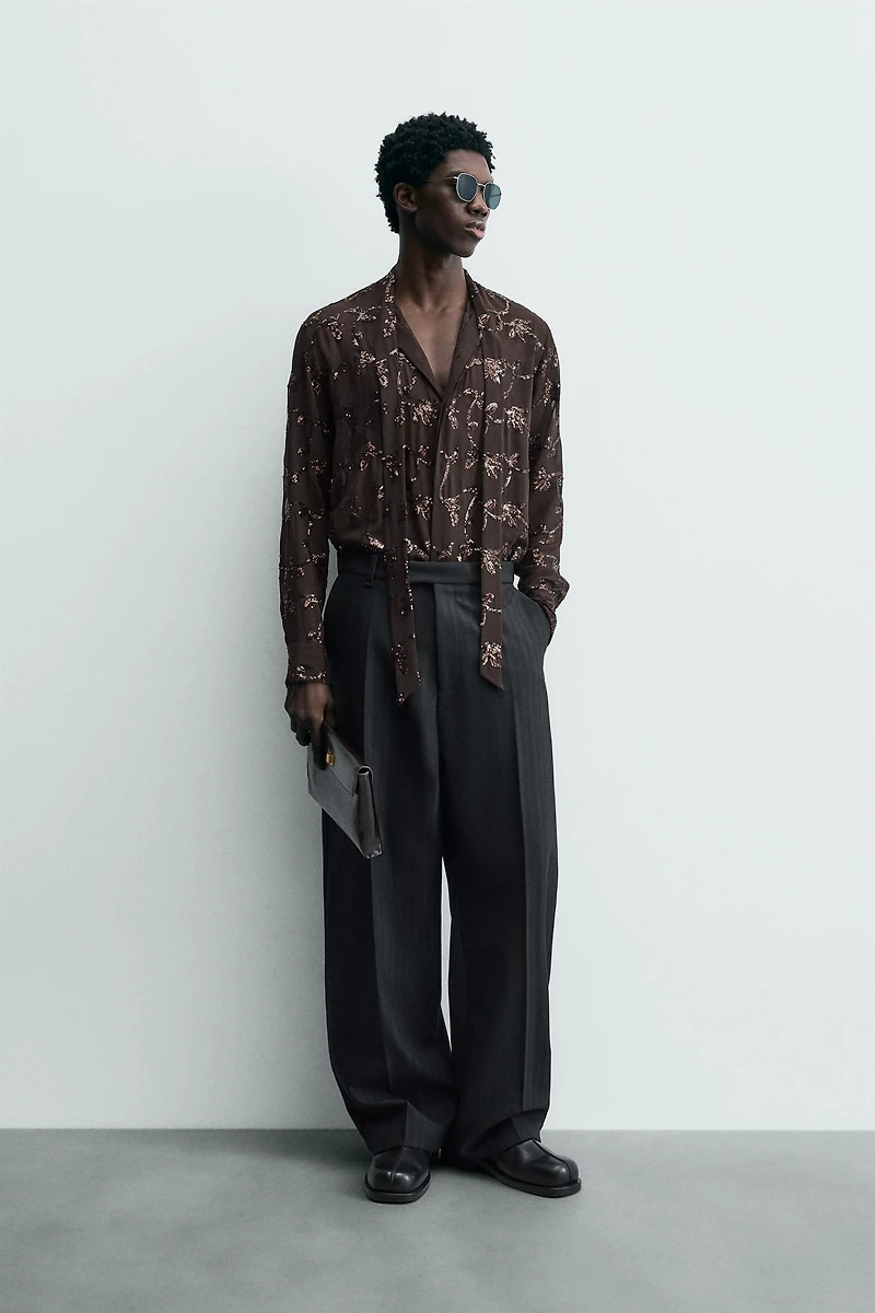 CHEMISE SEMI-TRANSPARENTE À PAILLETTES LIMITED EDITION