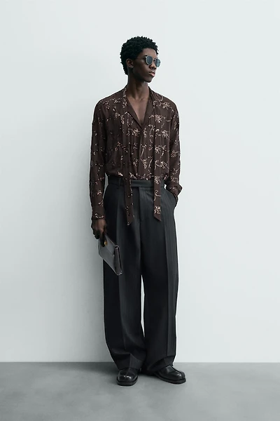 CHEMISE SEMI-TRANSPARENTE À PAILLETTES LIMITED EDITION