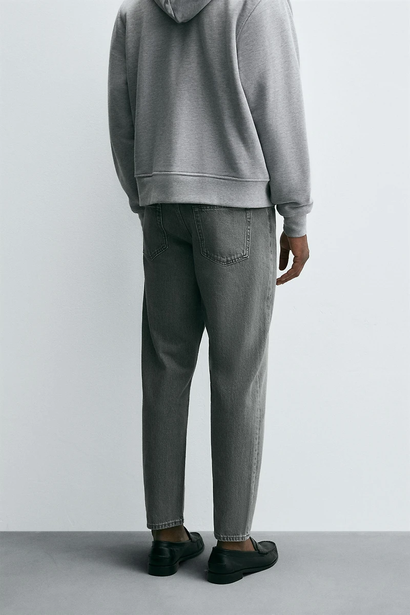 SLIM TAPERED FIT JEANS