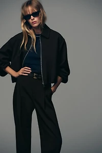BELTED PLEATED PANTS