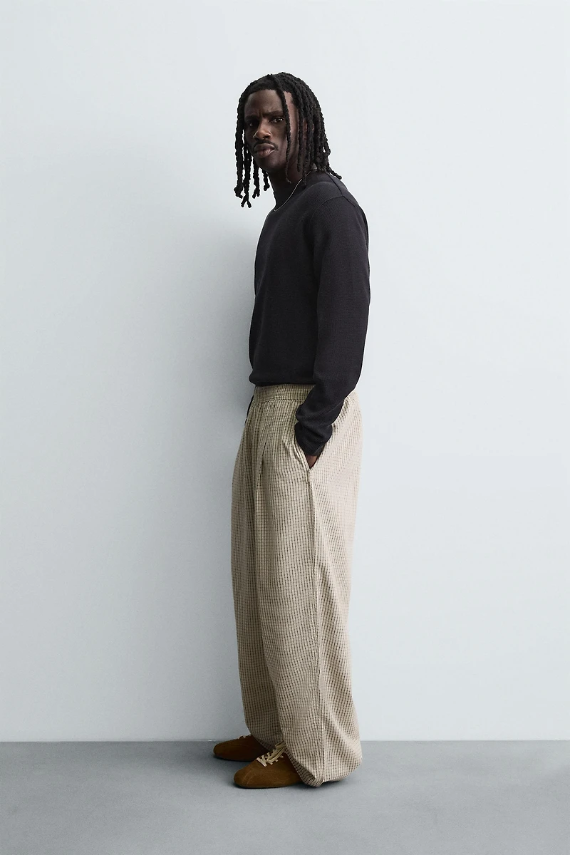 BALLOON FIT PLEATED PANTS
