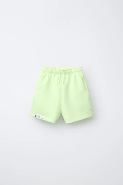 SHORT SPORT NÉOPRÈNE FLUO