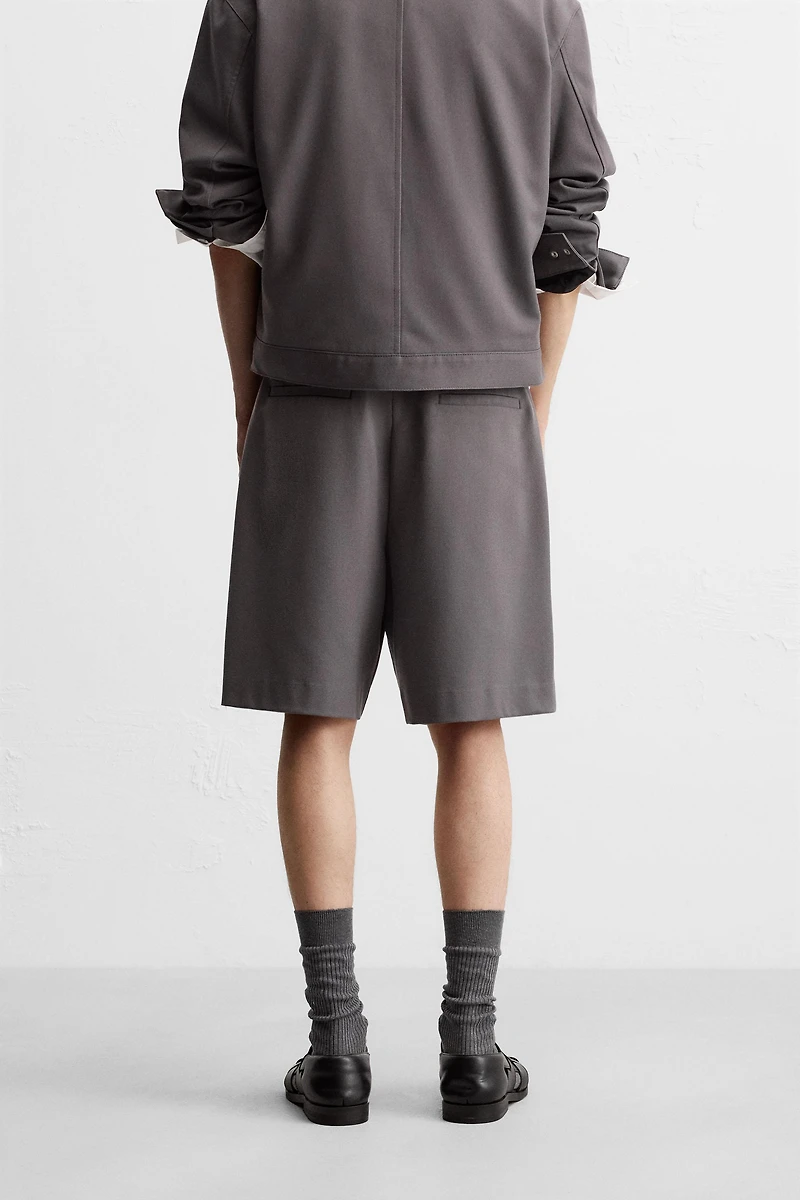 PLEATED RELAXED FIT SHORTS