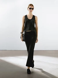 Flared trousers with waist detail