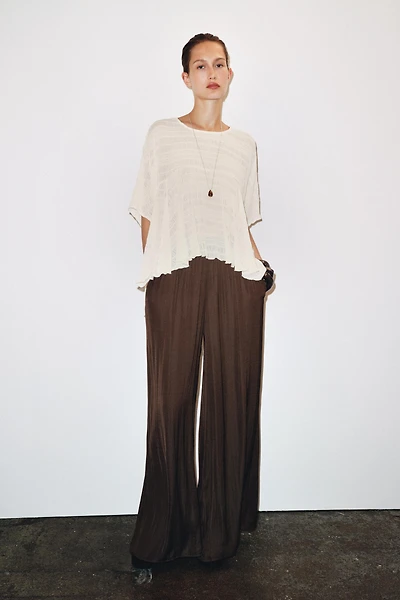 ASYMMETRIC TEXTURED CAPE