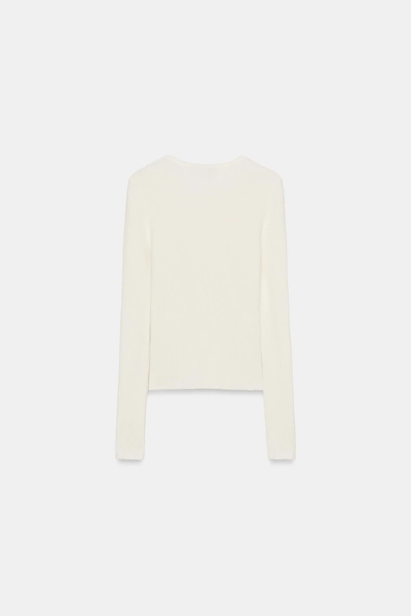 PULL CÔTELÉ AVEC LAINE