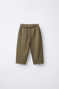 TEXTURED PANTS WITH LABEL