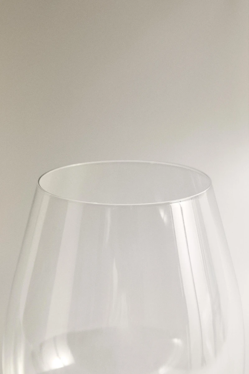 ULTRA LIGHTWEIGHT CRYSTALLINE GLASS