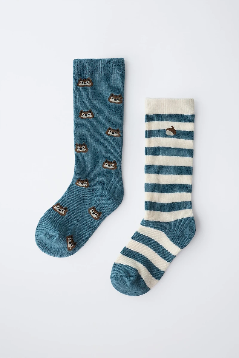 LOT DE DEUX PAIRES CHAUSSETTES RAYÉES AVEC MOTIFS GLANDS ET D'ÉCUREUILS
