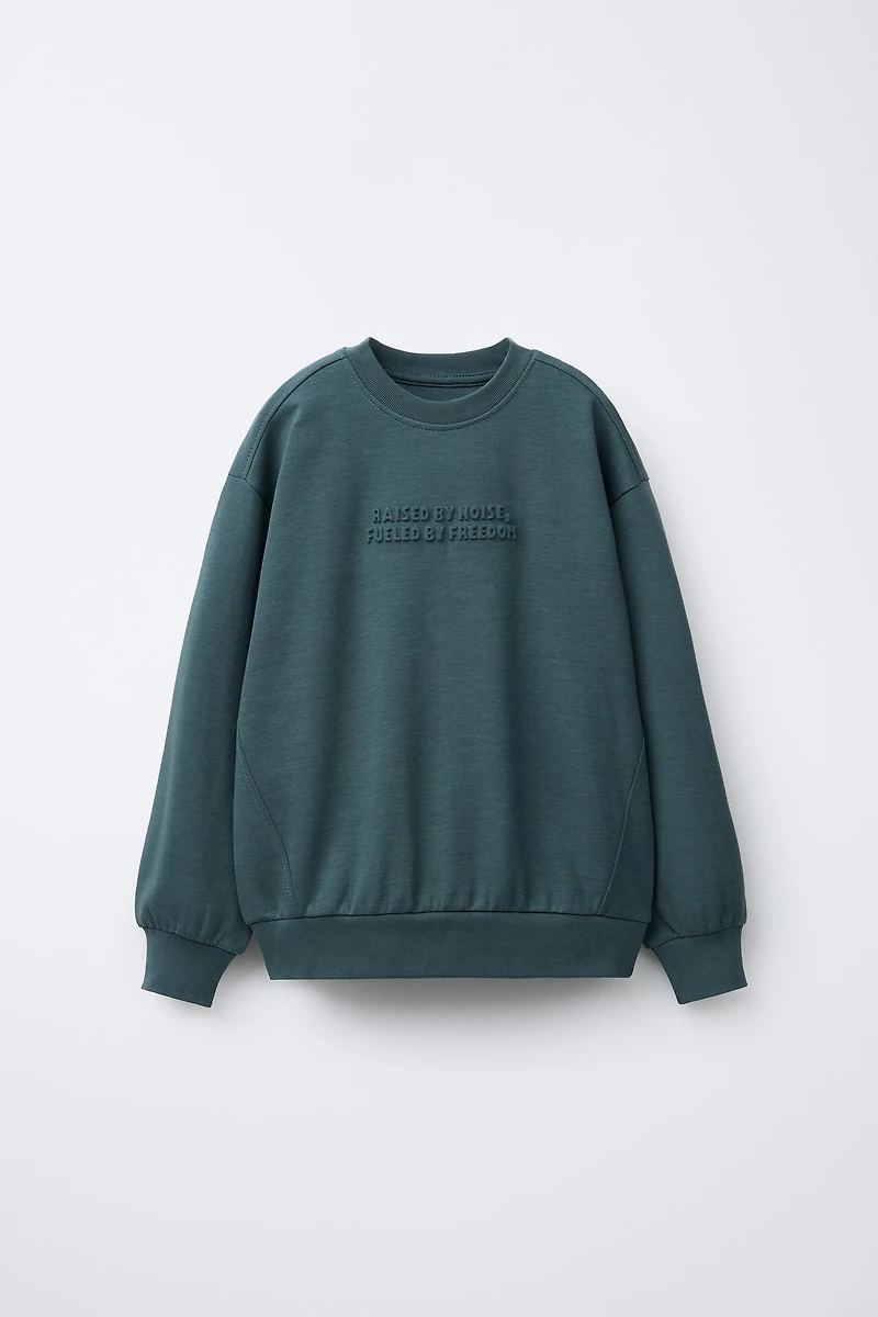 ENSEMBLE INTERLOCK SWEAT ET JOGGER INSCRIPTION EN RELIEF