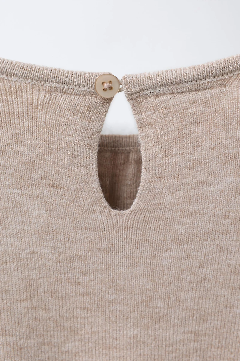 ROBE EN MAILLE À NŒUDS