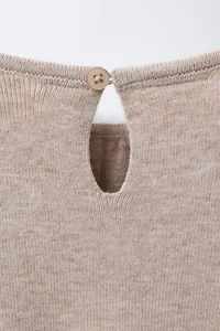 ROBE EN MAILLE À NŒUDS