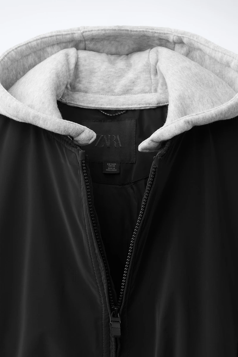 RUBBERIZED BOMBER JACKET WITH DETACHABLE HOOD