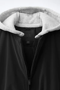 RUBBERIZED BOMBER JACKET WITH DETACHABLE HOOD