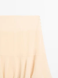 Long ruffled skirt with sash
