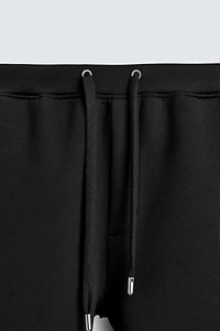 WIDE FIT NEOPRENE EFFECT PANTS