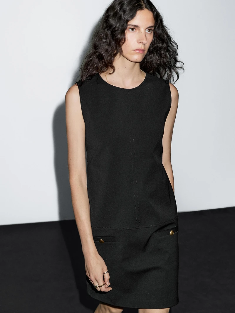 Short dress with button details