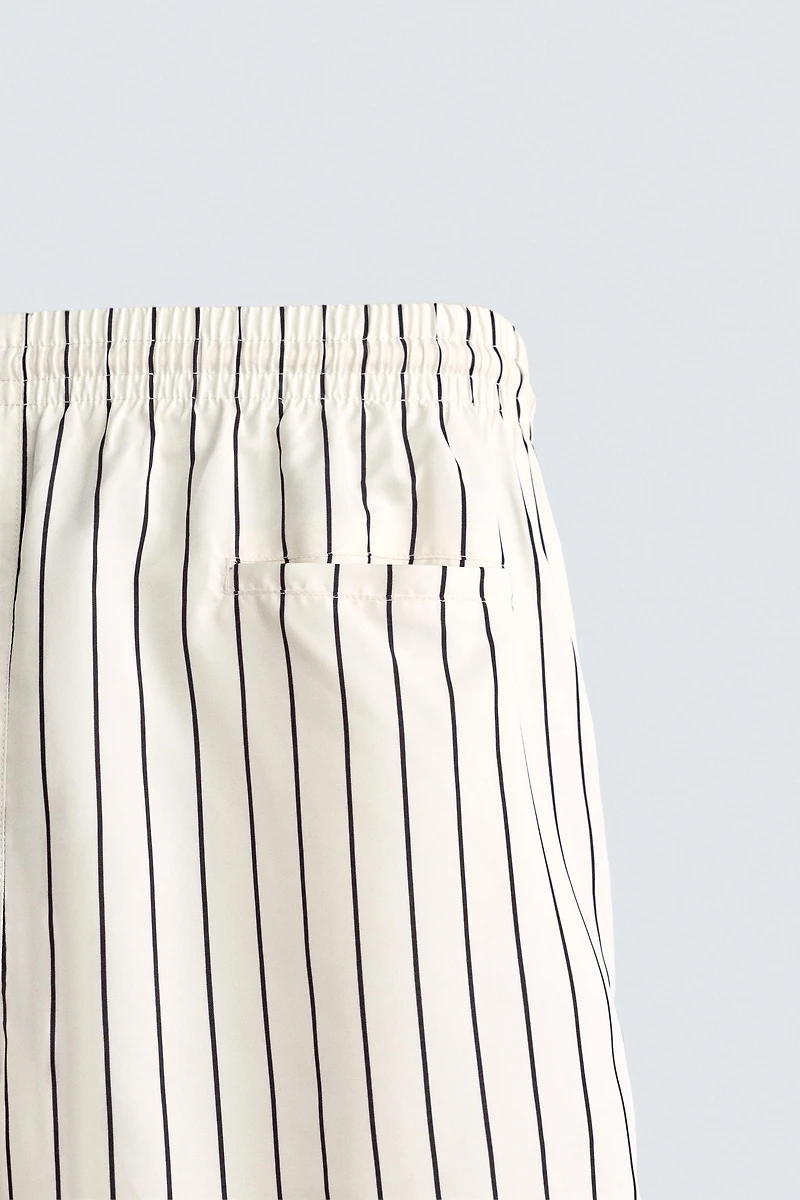 STRIPED MID-LENGTH SWIM TRUNKS