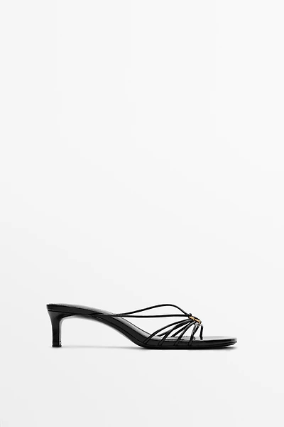 Strappy heeled sandals with embellished detail