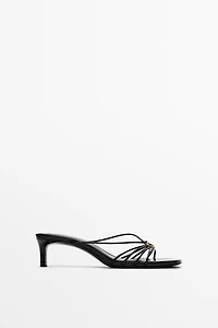 Strappy heeled sandals with embellished detail