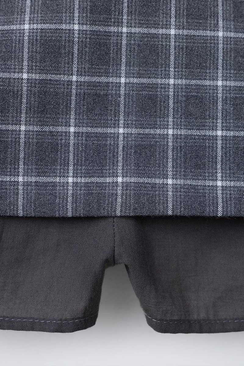 JUPE-SHORT À CARREAUX AVEC CEINTURE