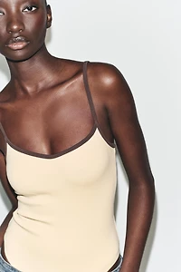 CONTRAST TRIM BODYSUIT