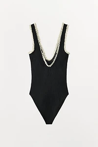 SEAMLESS LACE BODYSUIT