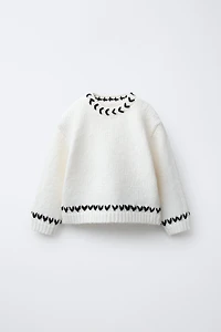 KNIT JUMPER WITH PIPING