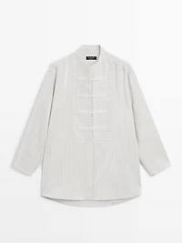 Striped oversize blouse with stand collar