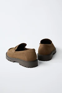 MOCASSINS EN CUIR AVEC MASQUE