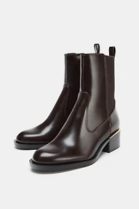 LOW HEELED ANKLE BOOTS WITH METALLIC DETAIL