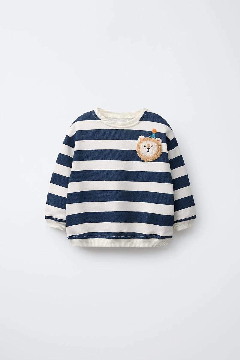 STRIPED SWEATSHIRT WITH LION PATCH