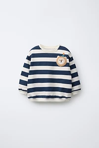 STRIPED SWEATSHIRT WITH LION PATCH