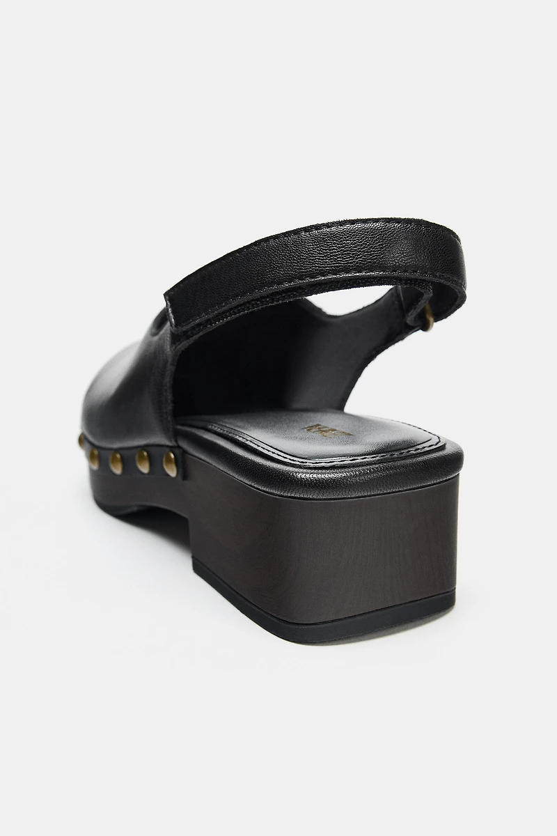 STUDDED LEATHER CLOGS