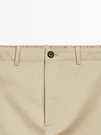 Trousers with patch pocket