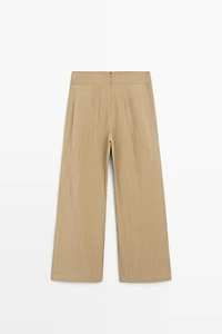 Palazzo trousers with box pleats
