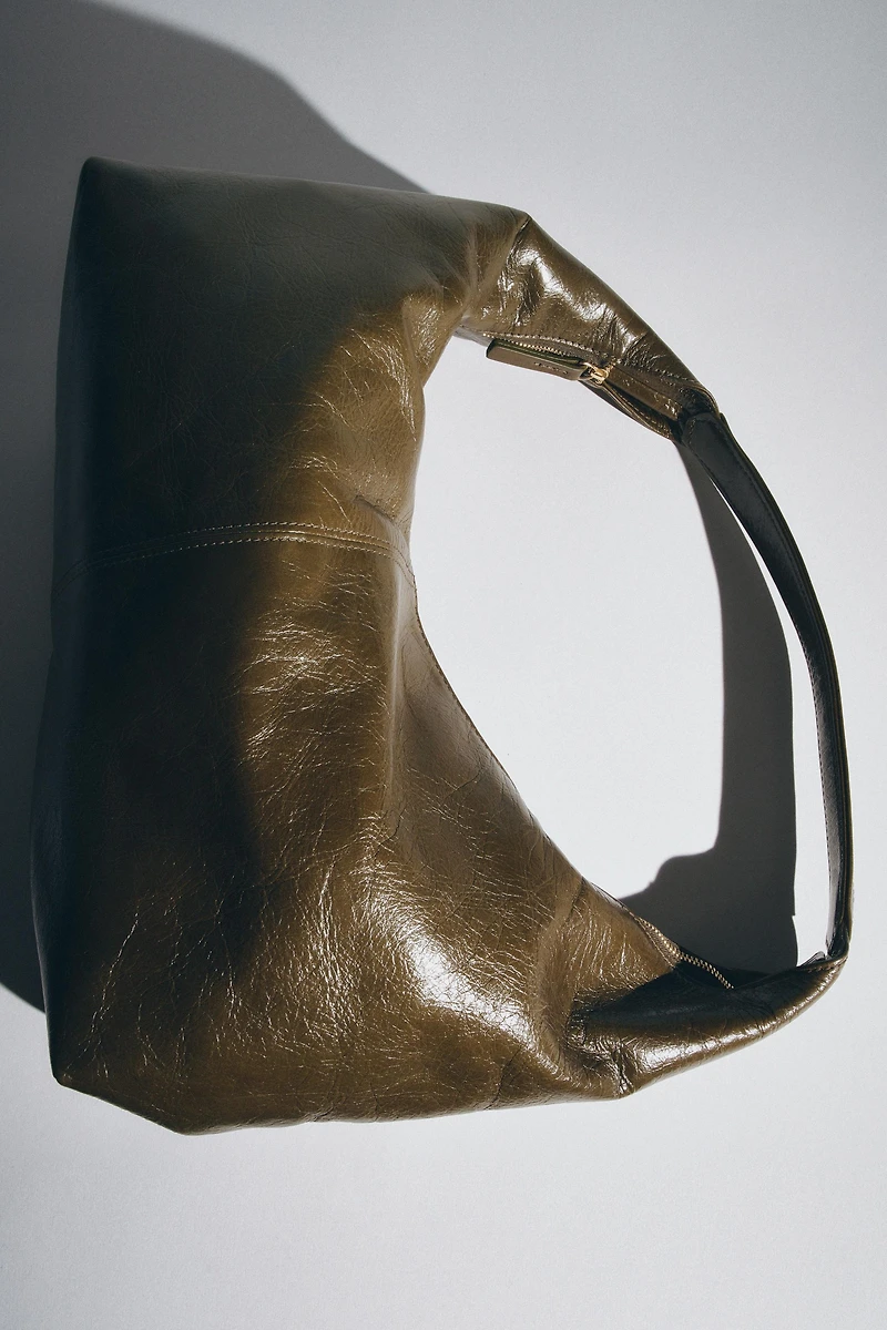 LEATHER OVAL BAG