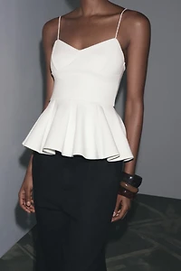 INTERLOCK PEPLUM STRAPPY TOP