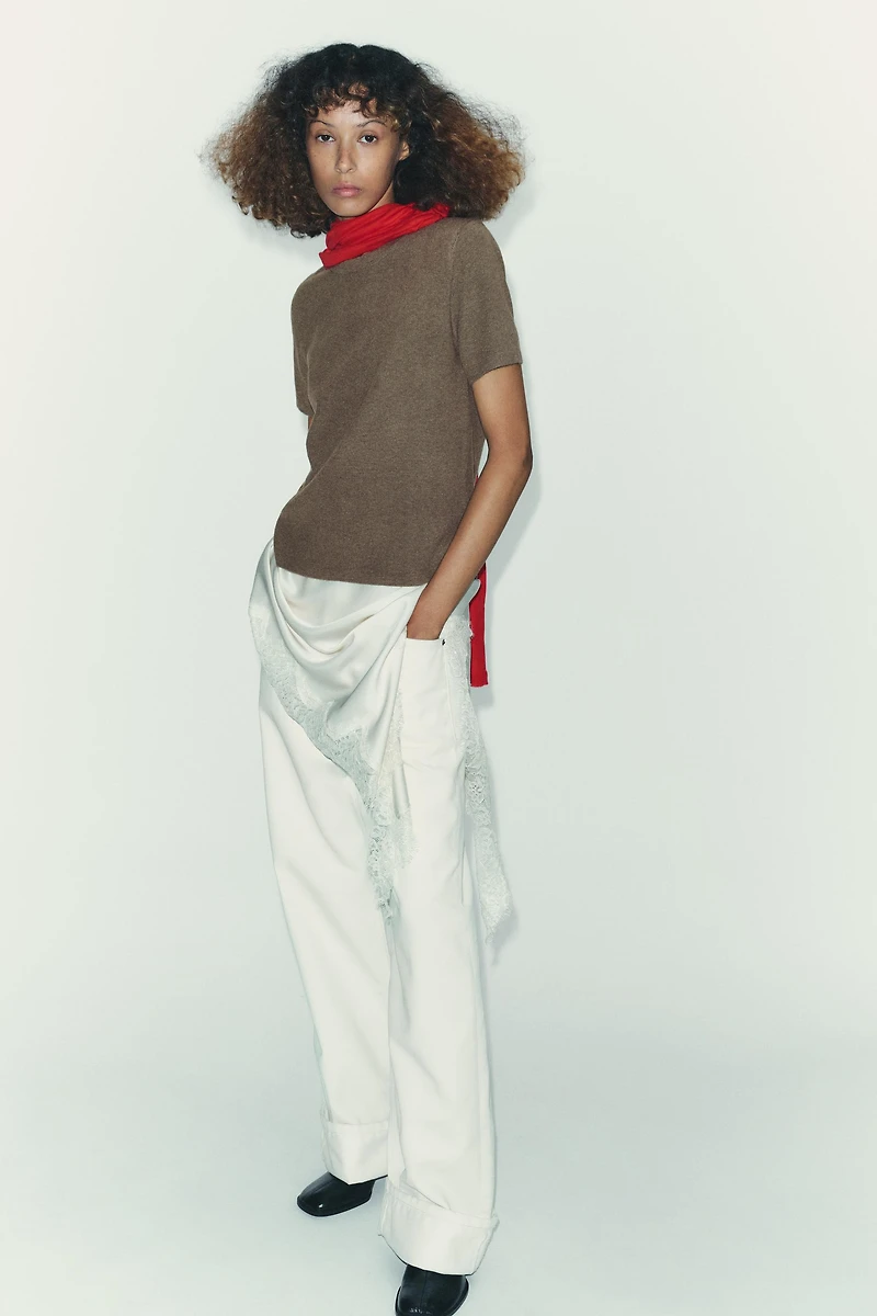 TOP EN MAILLE MANCHES COURTES AU TOUCHER DOUX
