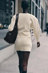 GILET EN MAILLE AJUSTÉ À BOUTONS