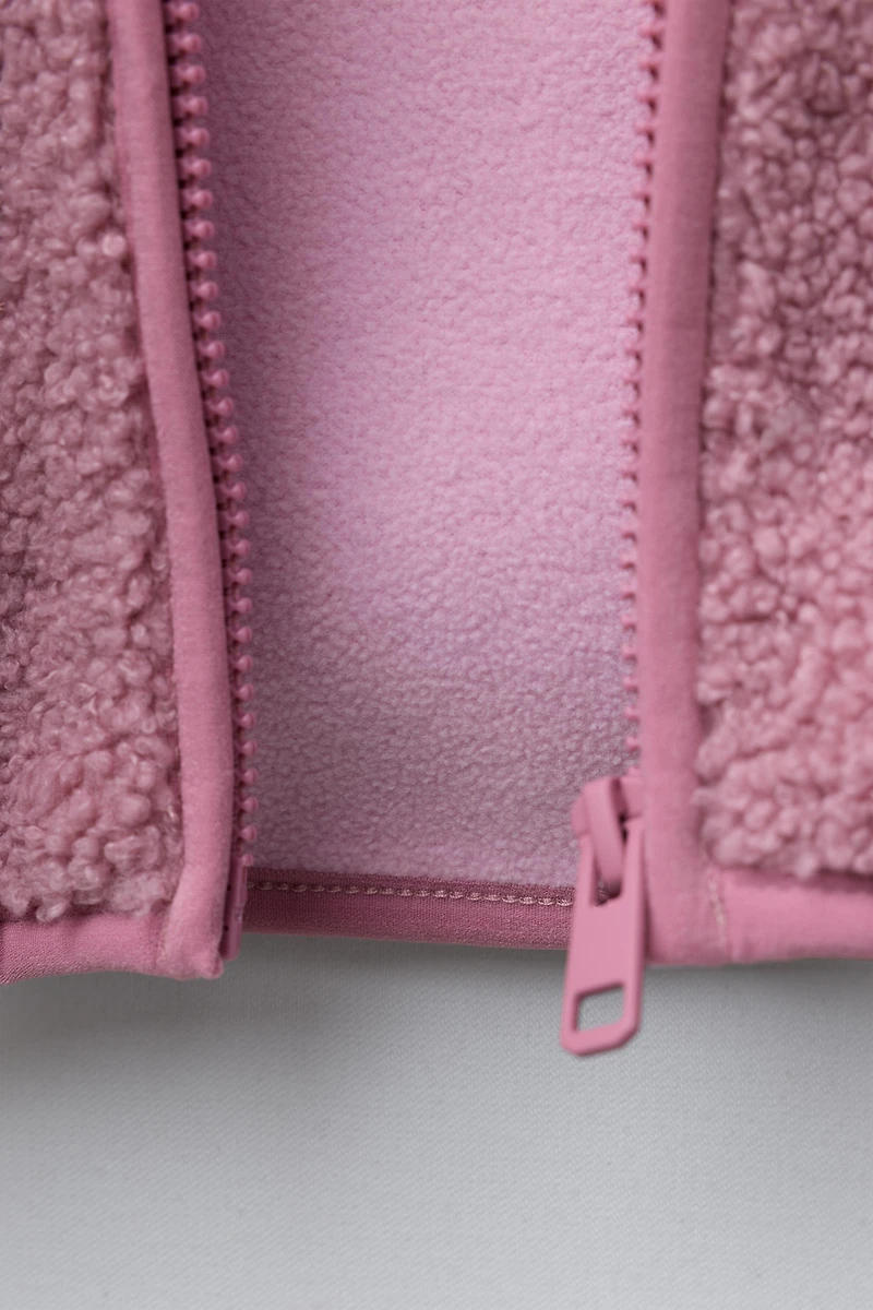 VESTE EFFET MOUTON À CAPUCHE