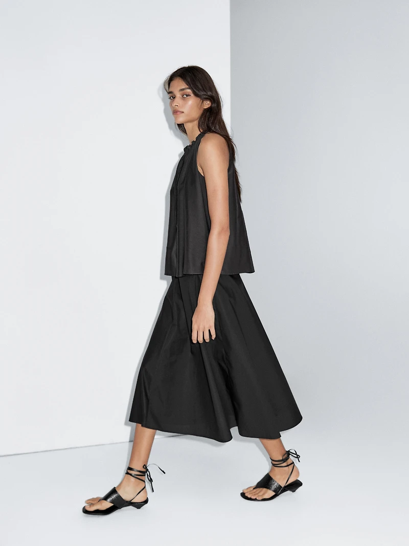 Jupe midi taille marquée