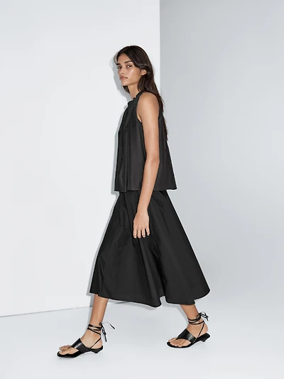 Jupe midi taille marquée
